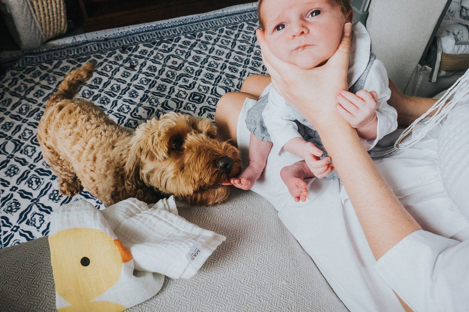 BABY BEING WINDED FULHAM NEWBORN PHOTOGRAPHER