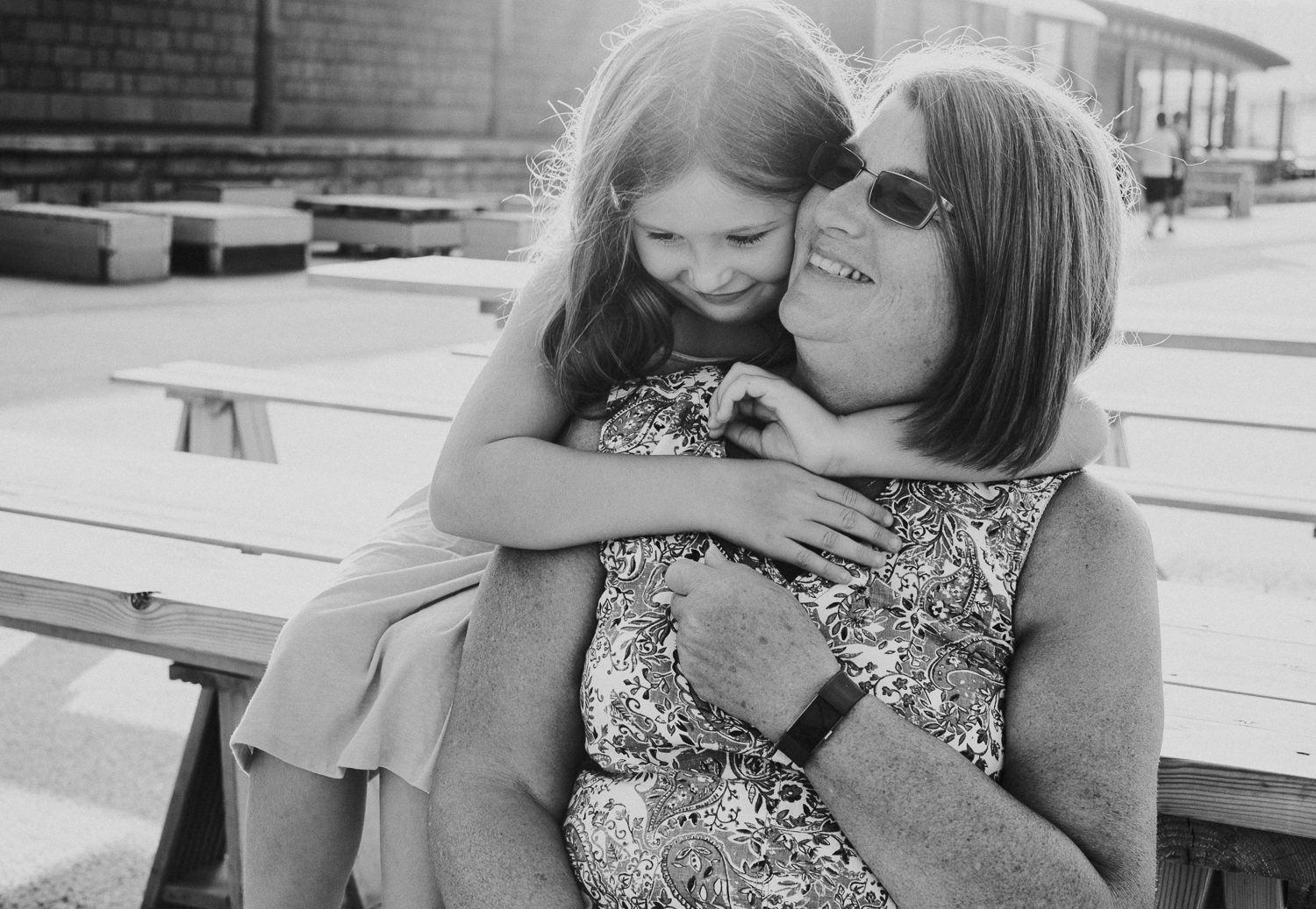 summer family photos in kent folkestone harbour arm child with grandmother
