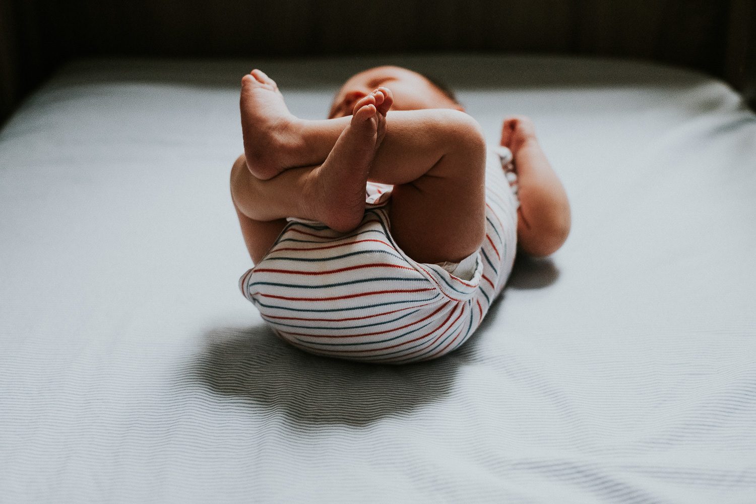 South Kensington Newborn Photographer. Baby crossed legs.