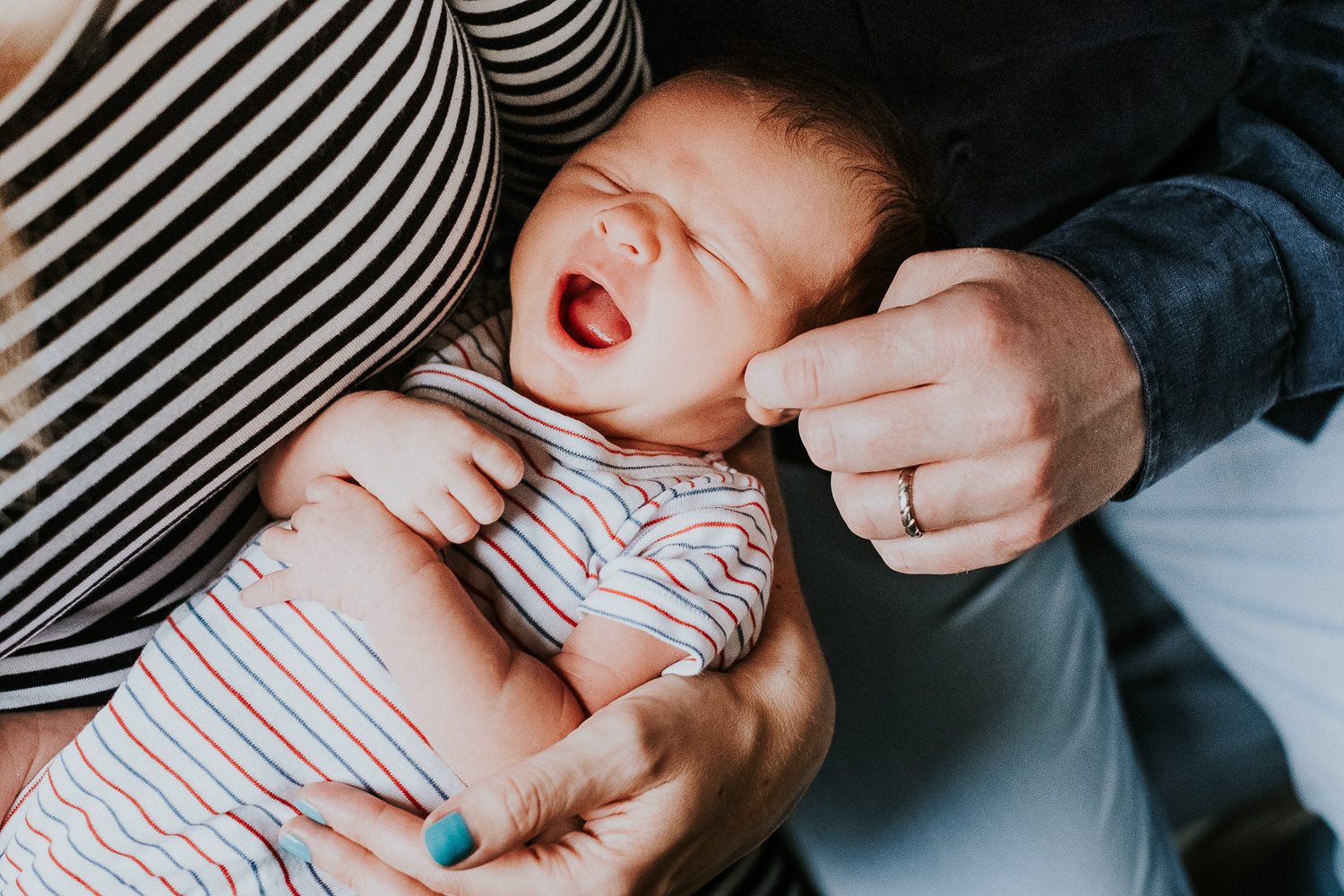 South Kensington Newborn Photographer. Baby girl yawning.