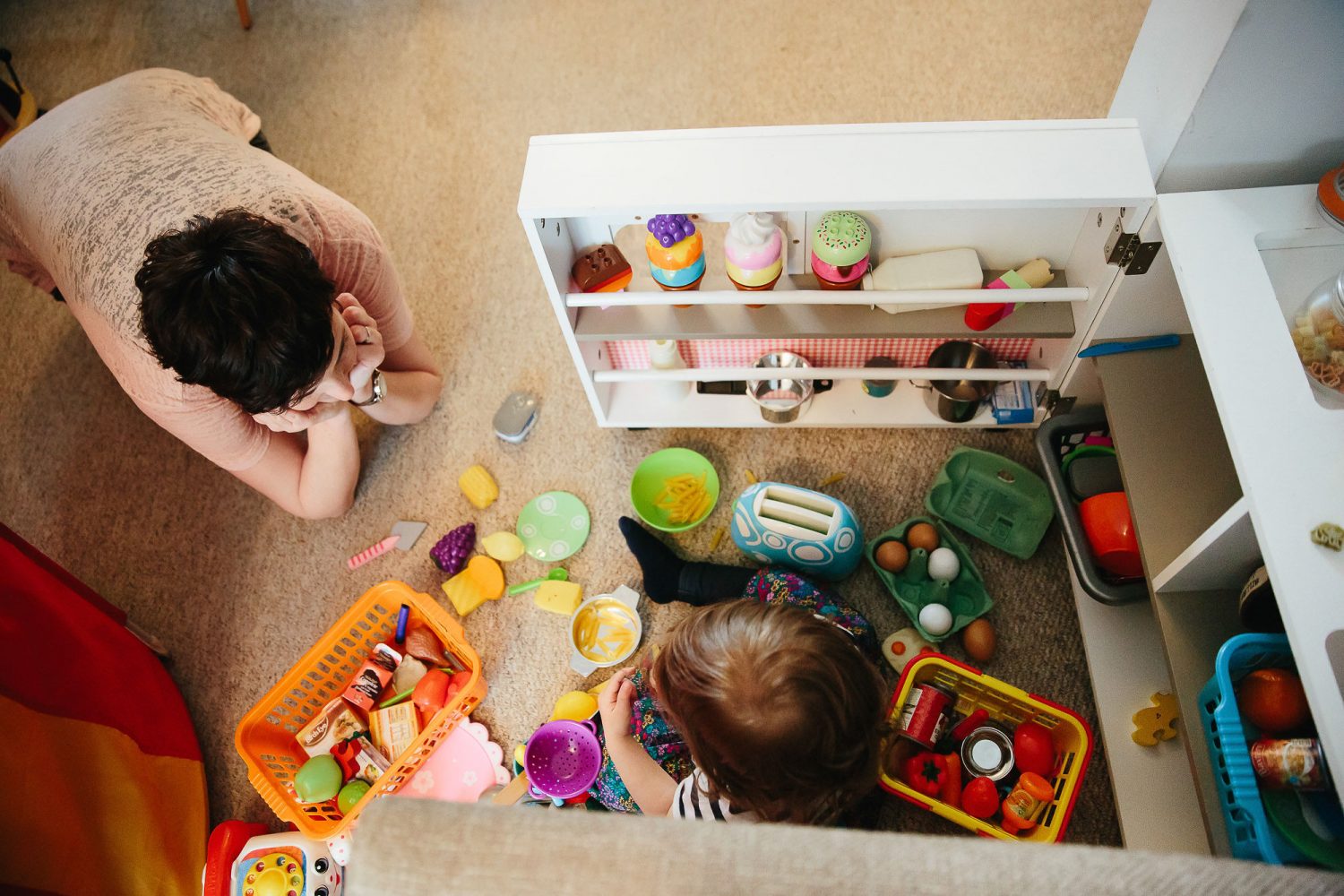 Mum playing shops with her child day in the life photography