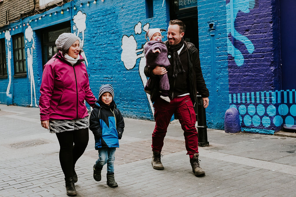 family walking in london wall art winter