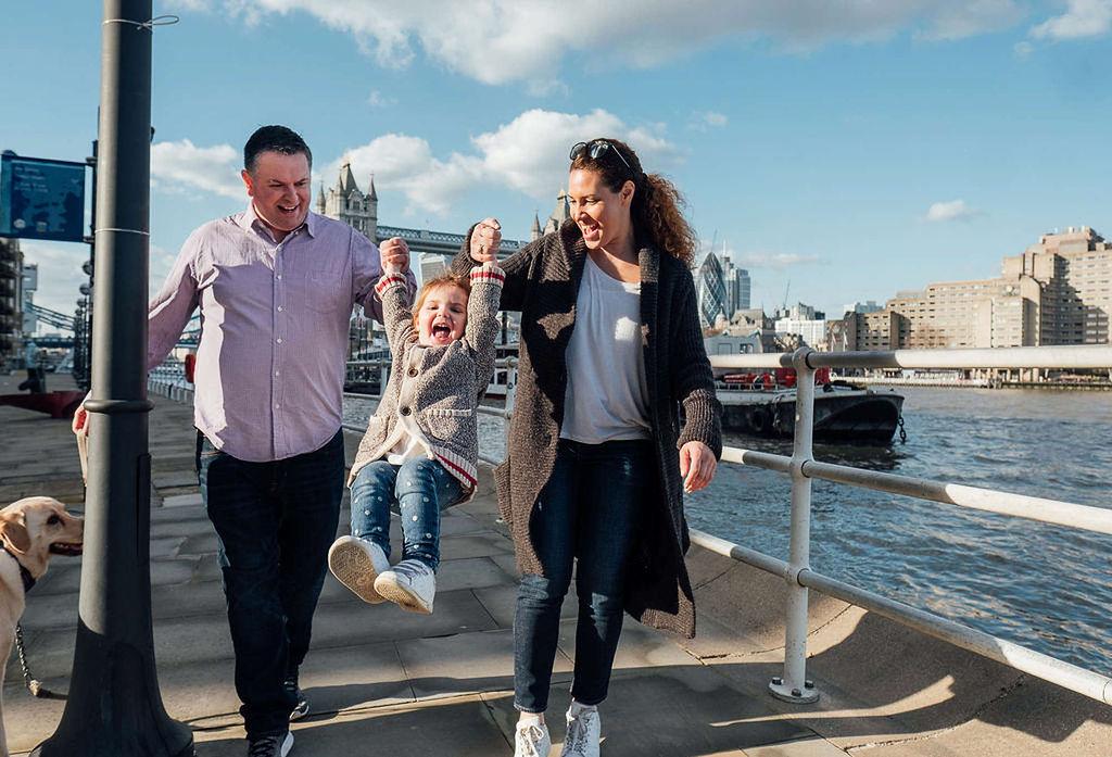 parents swinging toddler london family photos
