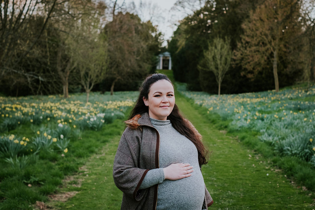 Maternity photographer Kent - pregnancy bump in countryside