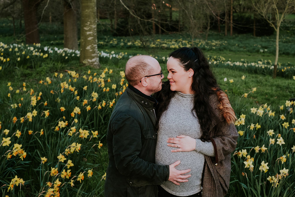 Maternity photographer Kent - couple in Spring countryside