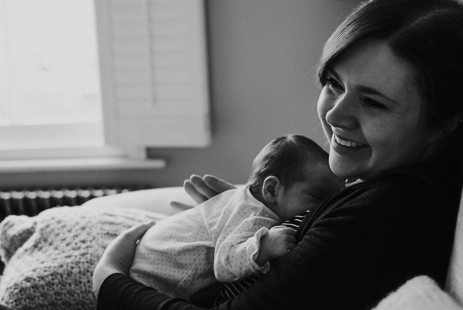 Newborn Photo Shoot at home black and white image Mum and baby