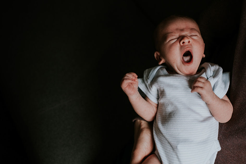 Newborn baby yawning