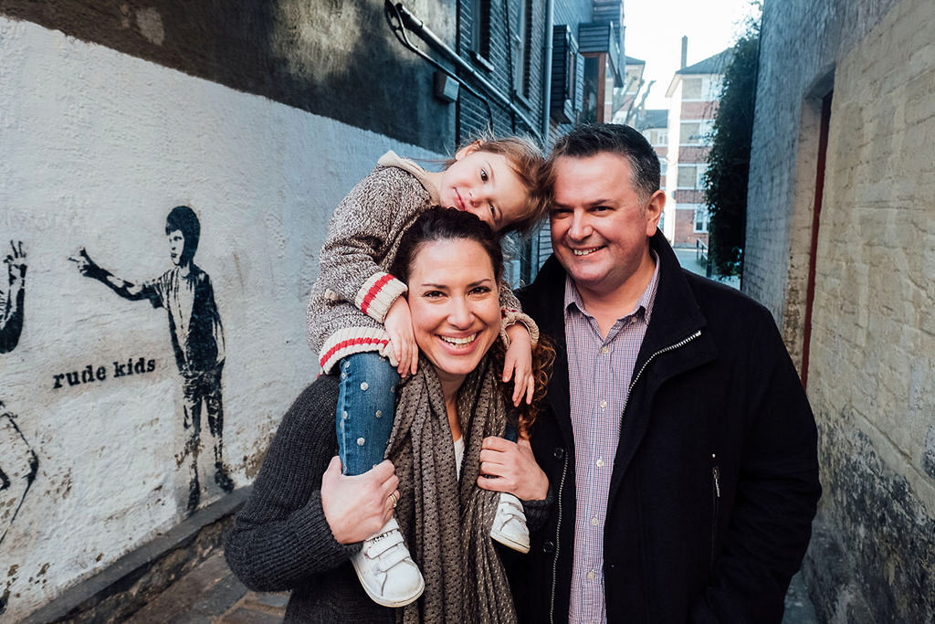 london family photographs parents with toddler on mums shoulders
