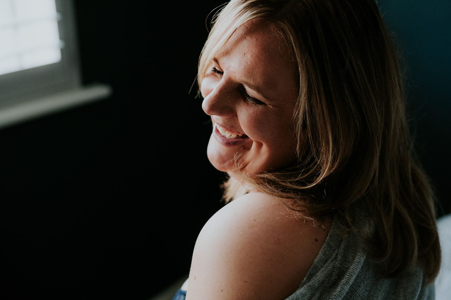 kent boudoir photographer close up laughing woman