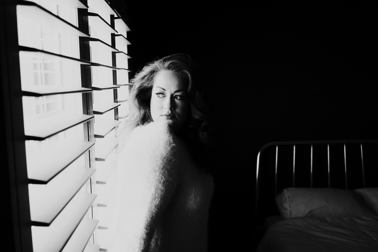 kent boudoir photographer black and white window shutter pose