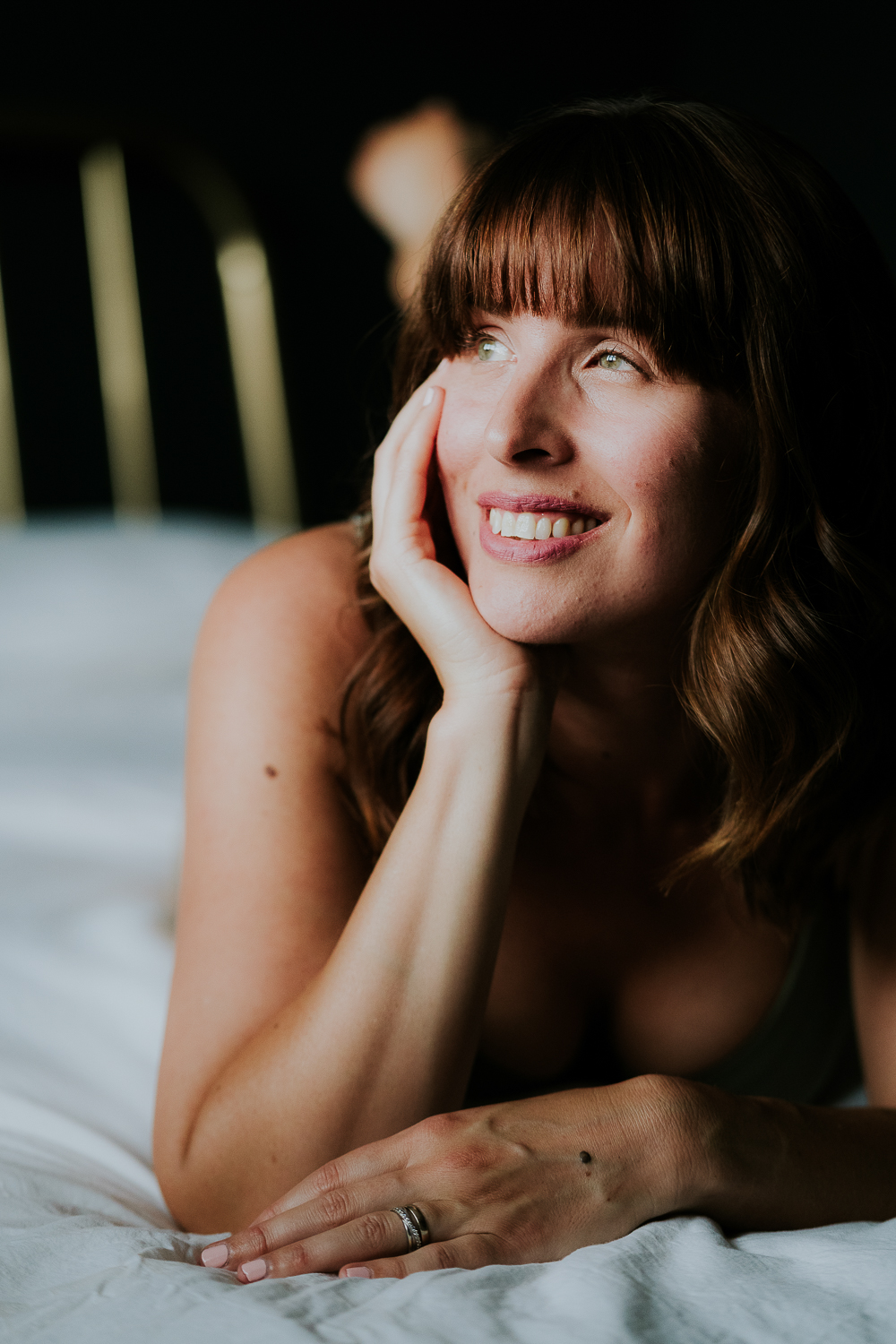 kent boudoir photographer close up relaxed woman smiling