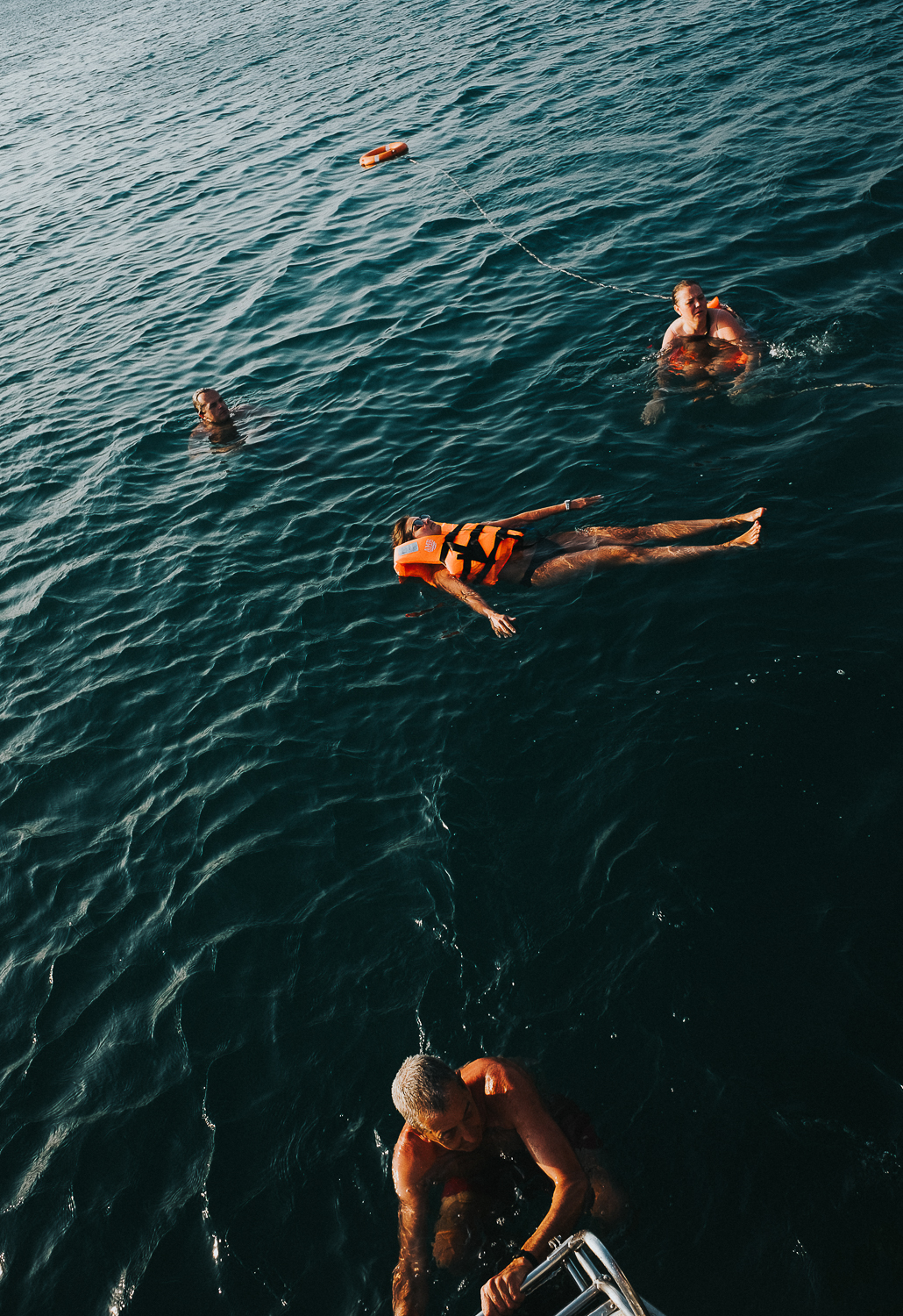Thailand sea people swimming with lifejackets on