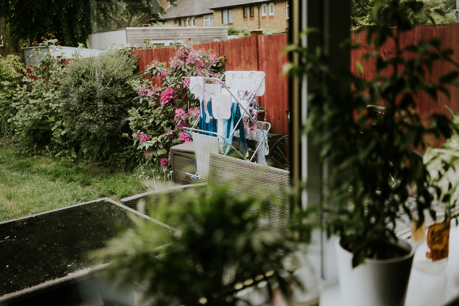 day in the life photo shoot baby laundry hanging on line in garden
