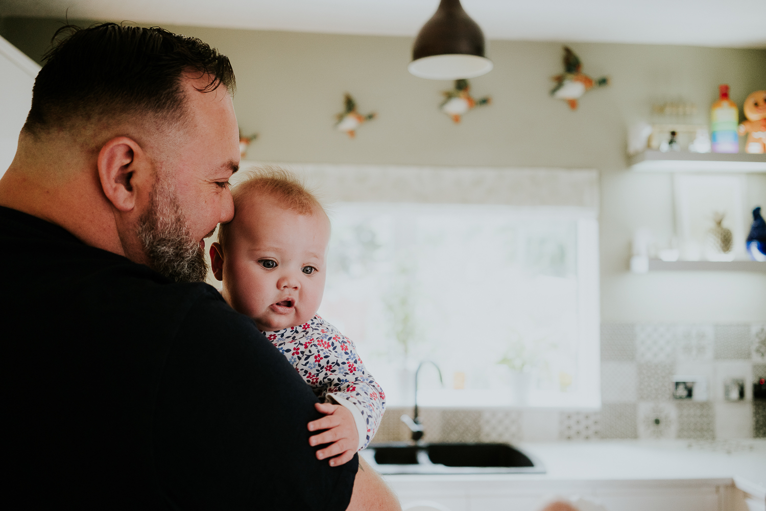 day in the life photo shoot father and baby girl in kitchen