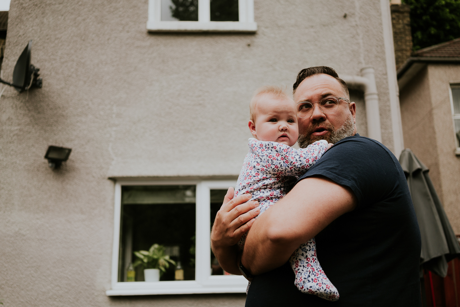 day in the life photo shoot father and baby girl outside family home