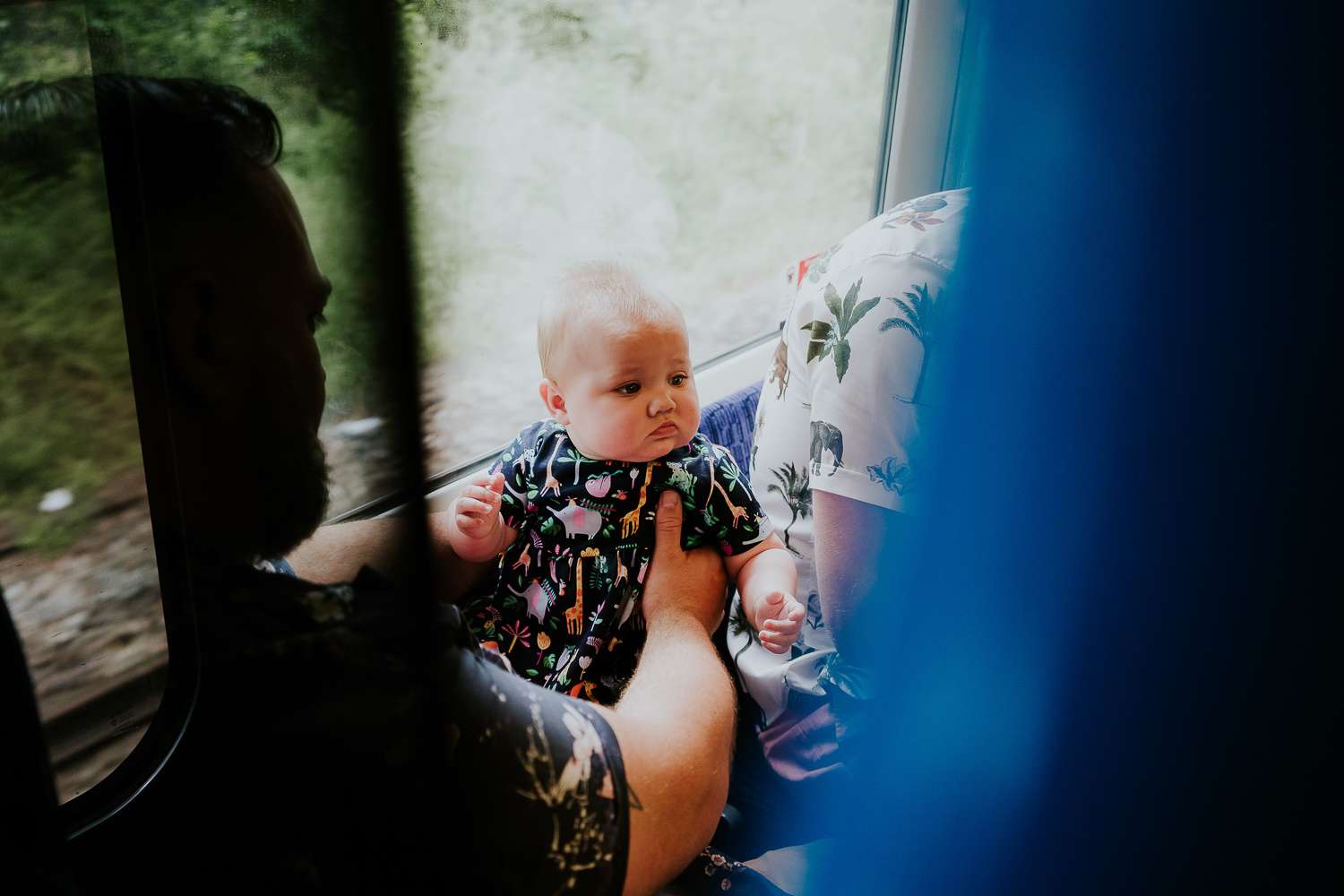day in the life photo shoot father and baby girl on train