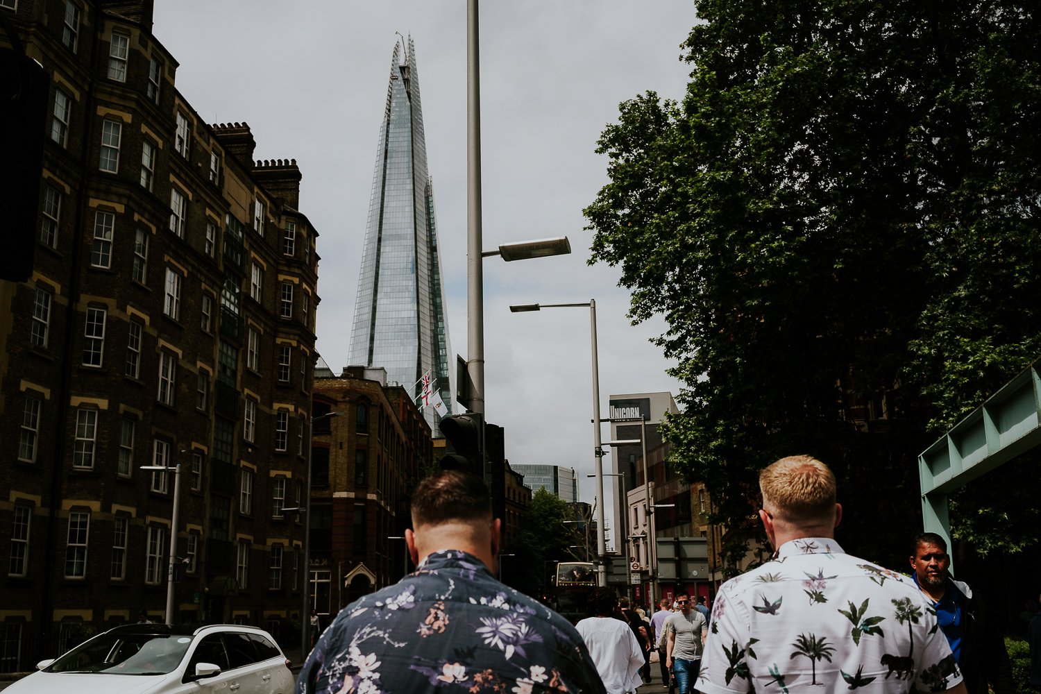 day in the life photo shoot two dads walking with shard building in background