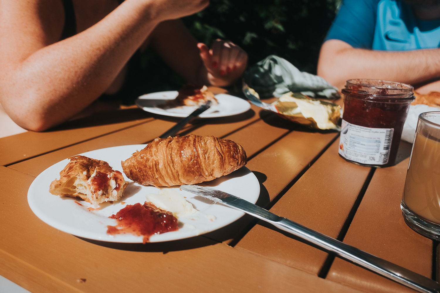 CLOSE UP CROISSANT BREAKFAST PLATE FAMILY PHOTOGRAPHY AT CENTER PARCS FRANCE LAC D'AILETTE