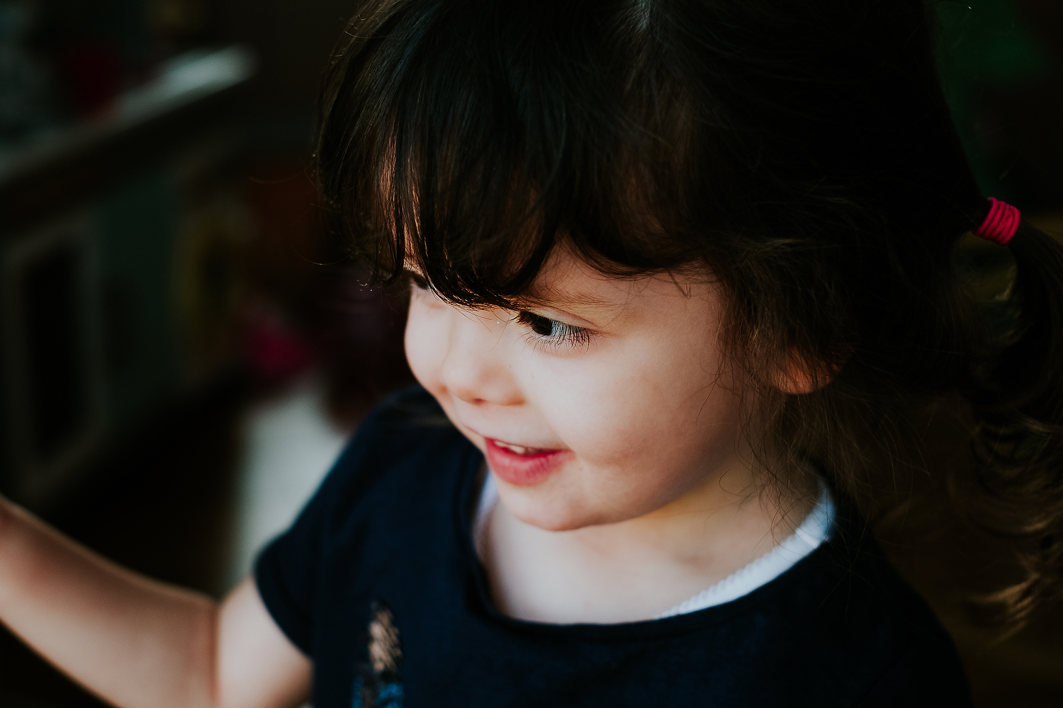 toddler girl face close up at home islington family photographer
