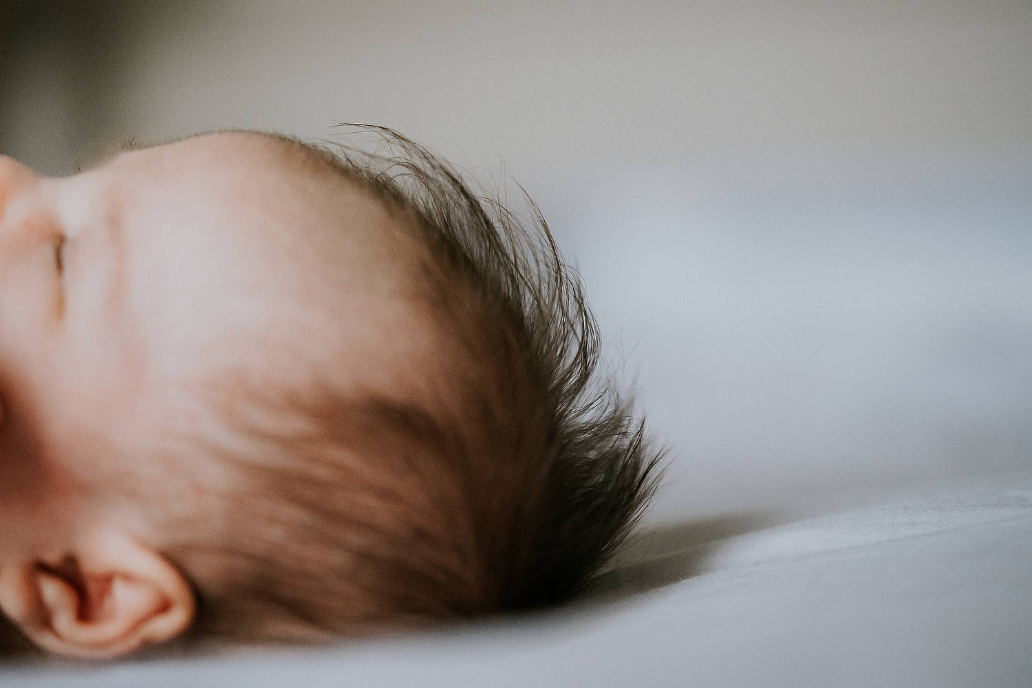 close up baby hair newborn photography in hammersmith