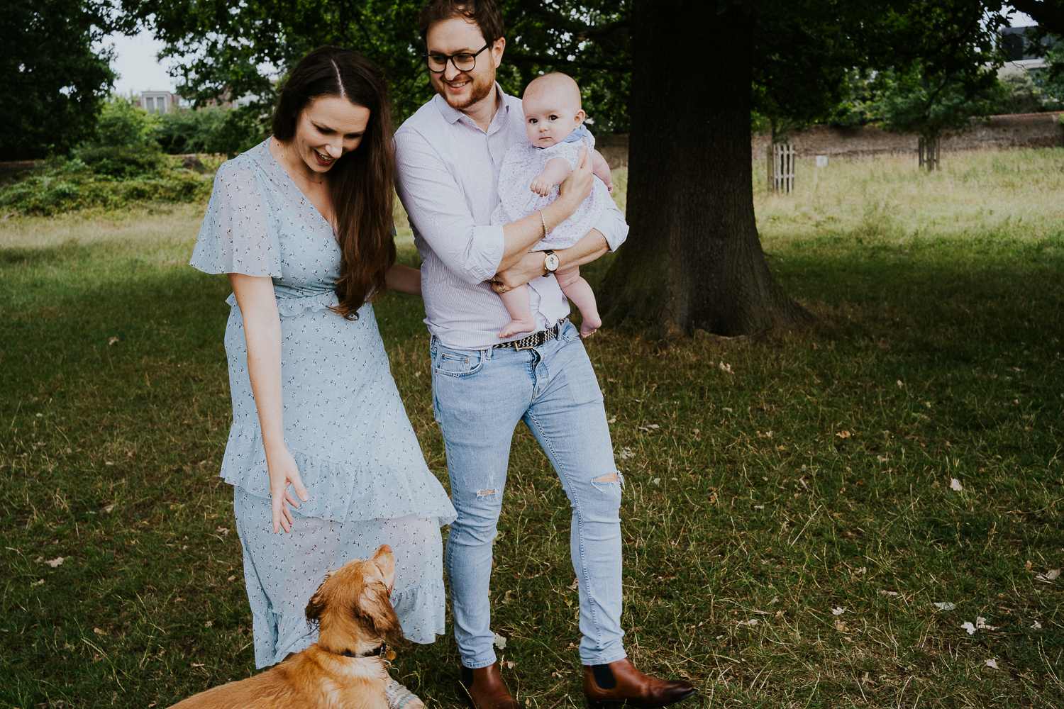 SPRING MINI PHOTO SESSIONS FAMILY WALKING IN RICHMOND PARK WITH DOG IN SUMMER