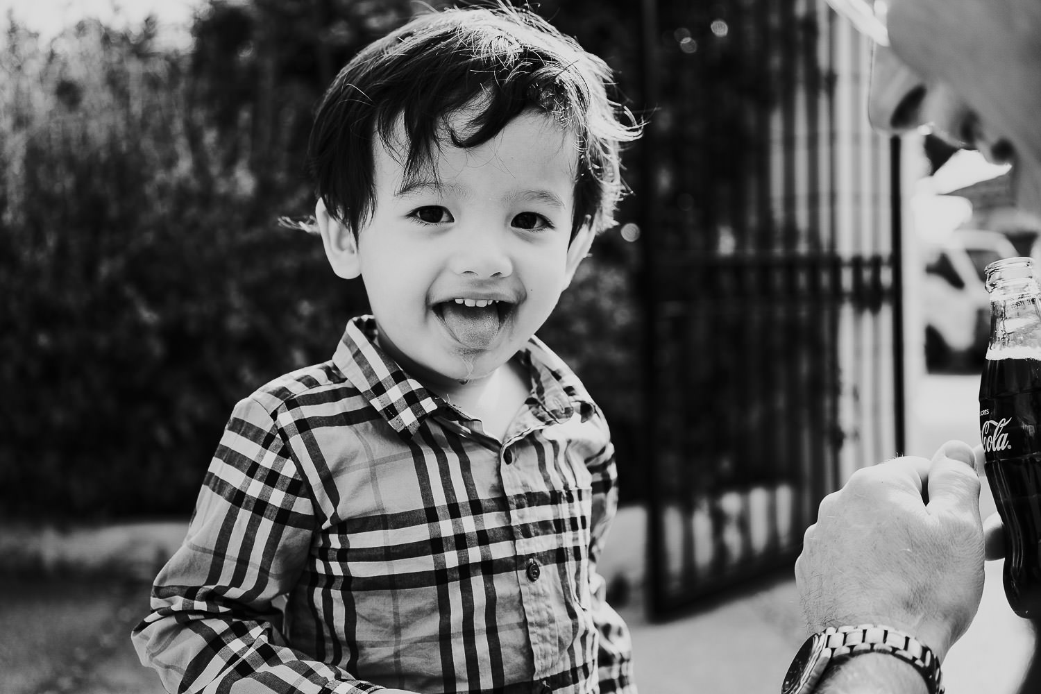father and son in hotel gardens at a family vacation photo shoot in the south of france grand hotel du cap ferrat