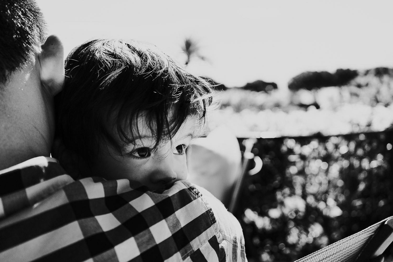 father and son in hotel gardens at a family vacation photo shoot in the south of france grand hotel du cap ferrat