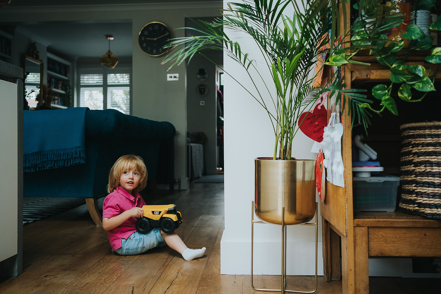 young boy with toy truck